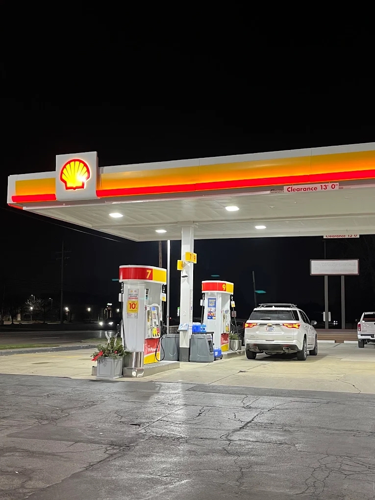 Shell fuel pumps and canopy at night