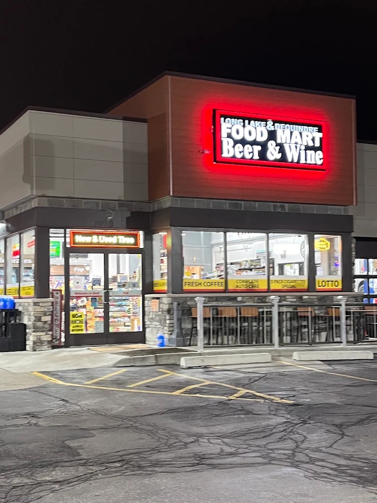 Shell convenience store exterior at night